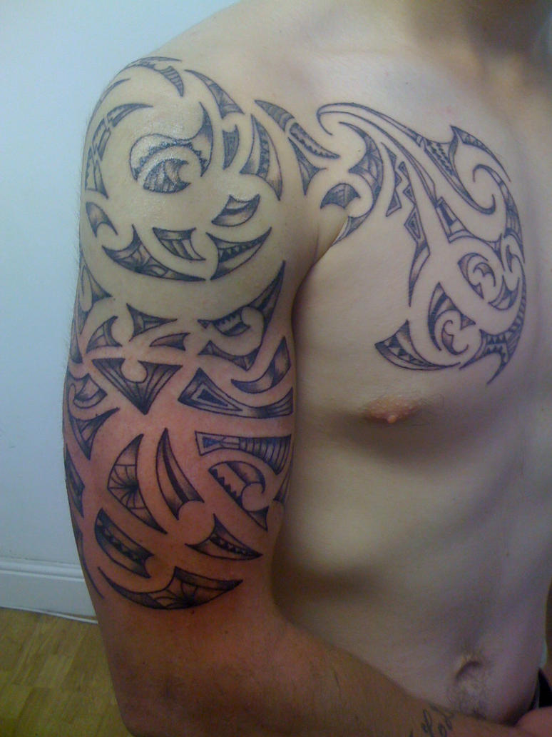maori arm chest - chest tattoo