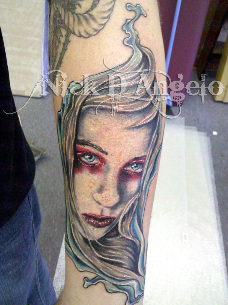 female with tattoo
